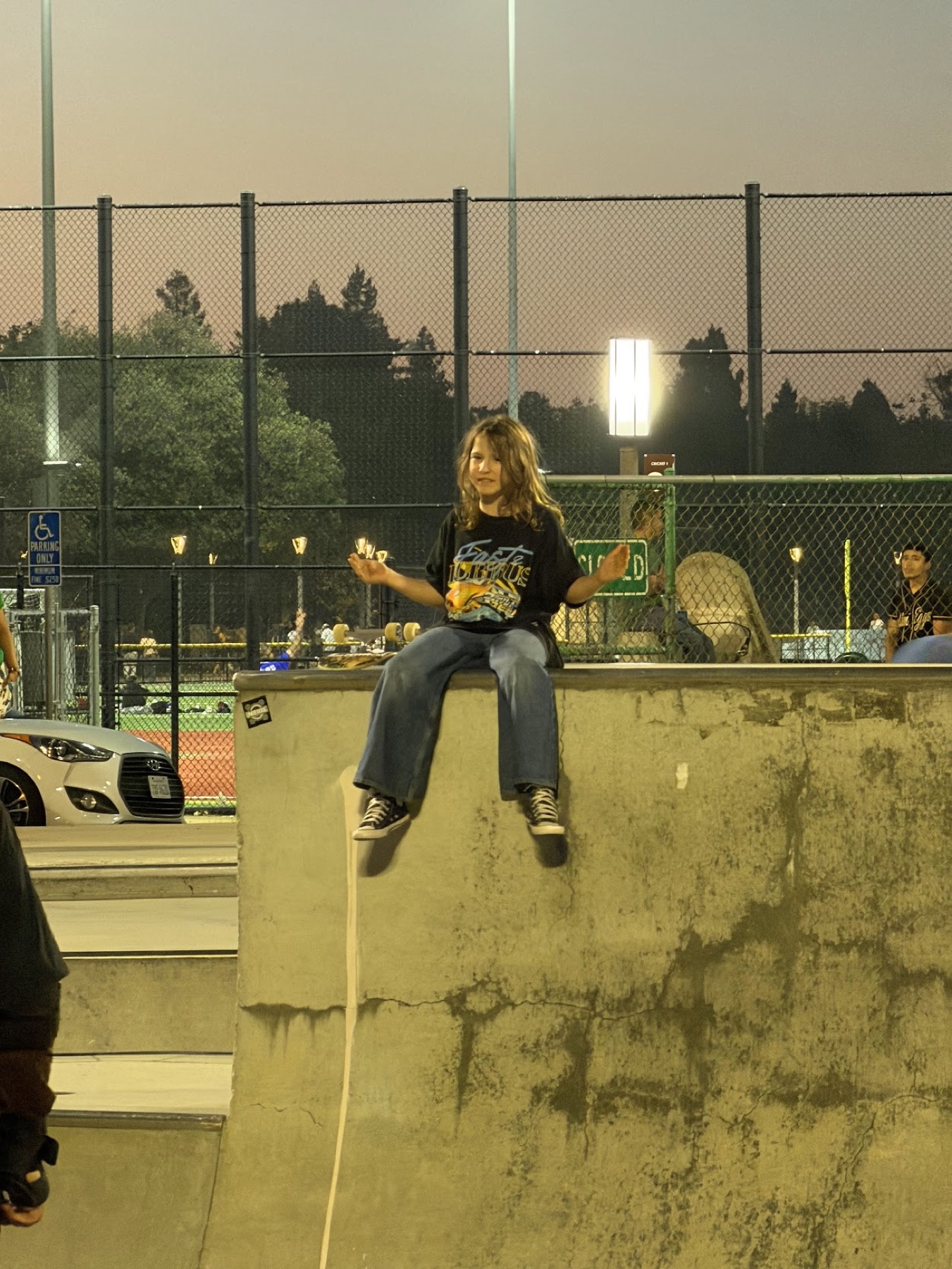 Taking a break at a night skatepark